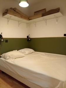 Postel nebo postele na pokoji v ubytování Appartement cosy Barcelonnette