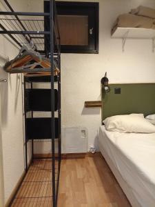Postel nebo postele na pokoji v ubytování Appartement cosy Barcelonnette