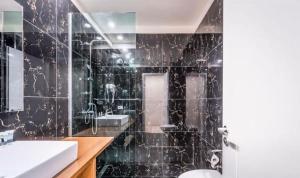 Koupelna v ubytování Ajsel Hotel