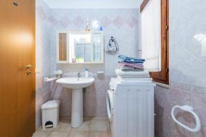 Ένα μπάνιο στο Casa Vacanze dei Pini +21 φωτογραφίες