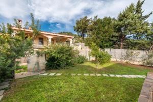 Κήπος έξω από το Casa Vacanze dei Pini