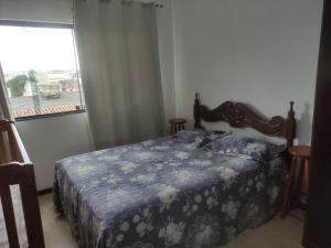 Postel nebo postele na pokoji v ubytování Excelente suíte próximo ao centro