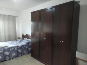 Postel nebo postele na pokoji v ubytování Excelente suíte próximo ao centro