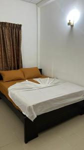 Postel nebo postele na pokoji v ubytování Himo Guest Inn