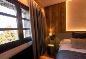 Giường trong phòng chung tại Borda Conangle Mountain Lodge