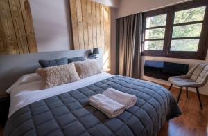 Postel nebo postele na pokoji v ubytování Borda Conangle Mountain Lodge