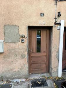 a door in the side of a building at Cozy Quiet City Center Apartment in Klaipėda