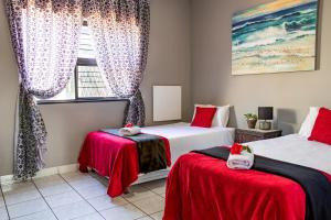 En eller flere senge i et værelse på Angel's Corner