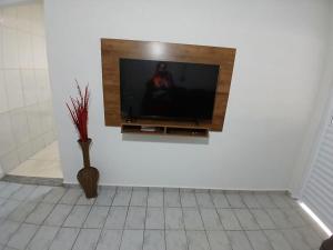 TV a/nebo společenská místnost v ubytování Refúgio Urbano