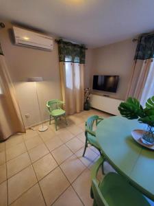 A television and/or entertainment centre at Sior Dionysios Apartments