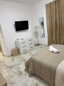 Letto o letti in una camera di Casa Rosa