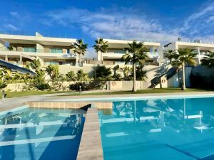 Swimmingpoolen hos eller tæt på Apartamento Luxury Campana Bay