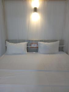 Postel nebo postele na pokoji v ubytování Chameera guest house