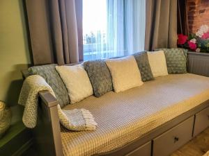 Posteľ alebo postele v izbe v ubytovaní Mi Casa Vendégház - Apartments