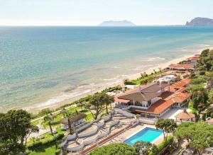 an aerial view of a resort and the beach at Holiday Village in Fondi