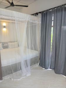 Postel nebo postele na pokoji v ubytování Chameera guest house
