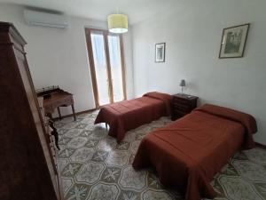 Cama o camas de una habitación en Casa SoleLuna