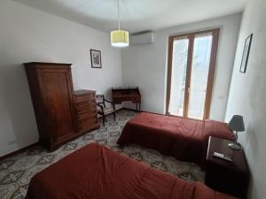 Cama o camas de una habitación en Casa SoleLuna