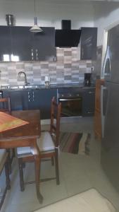 Kuchyň nebo kuchyňský kout v ubytování Appartement Beatrice Tantana #direkt am Meer#