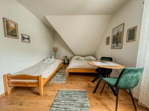 Posteľ alebo postele v izbe v ubytovaní Willa Konda - bania , sauna