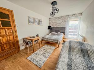 Posteľ alebo postele v izbe v ubytovaní Willa Konda - bania , sauna