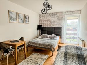 Posteľ alebo postele v izbe v ubytovaní Willa Konda - bania , sauna