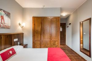 Postel nebo postele na pokoji v ubytování Hotel Snö Beret