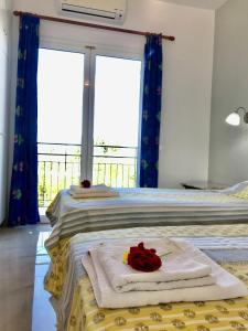 Postel nebo postele na pokoji v ubytování Room in Apartment - Beautiful Apartment in Corfu with Swimming Pool