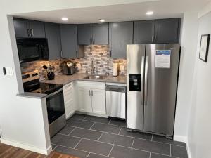 Η κουζίνα ή μικρή κουζίνα στο Modern Condo with Ski In & Ski Out - Silver Creek Lodge, Snowshoe