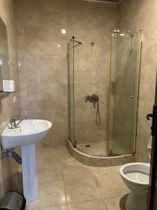 Koupelna v ubytování Hotel Cattaleya