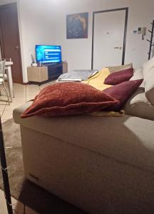 TV a/nebo společenská místnost v ubytování Casa di Minù