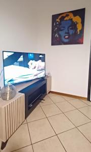 TV a/nebo společenská místnost v ubytování Casa di Minù