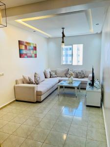 Χώρος καθιστικού στο Cosy chambre salon à 2 min harhoura