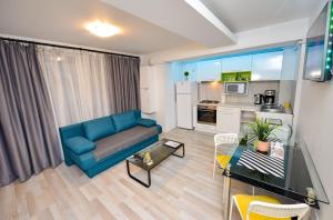 Kuchyň nebo kuchyňský kout v ubytování Harmony Suites