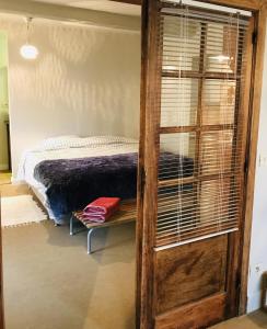 Postel nebo postele na pokoji v ubytování Panacée Guesthouses