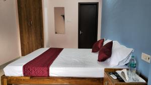 Postel nebo postele na pokoji v ubytování Pondy Pleasant Stay