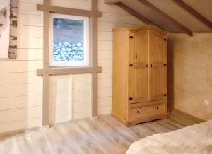 Posteľ alebo postele v izbe v ubytovaní Maison spacieuse à Arrentès-de-Corcieux avec jacuzzi