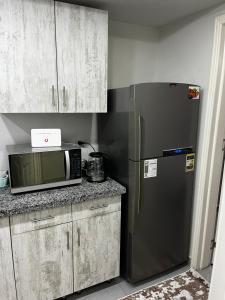 Kuchyň nebo kuchyňský kout v ubytování Scandic sea view B612