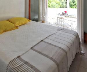 Posteľ alebo postele v izbe v ubytovaní Maison Vue Mer à Lumio avec Terrasse et Jardin Clos