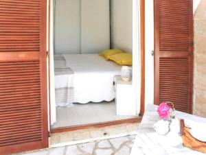 Posteľ alebo postele v izbe v ubytovaní Maison Vue Mer à Lumio avec Terrasse et Jardin Clos