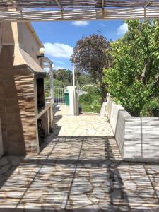 Balkón alebo terasa v ubytovaní Maison Vue Mer à Lumio avec Terrasse et Jardin Clos