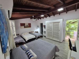 Postel nebo postele na pokoji v ubytování La Casa del Cerro by Nora Ruoti + 37 fotografií
