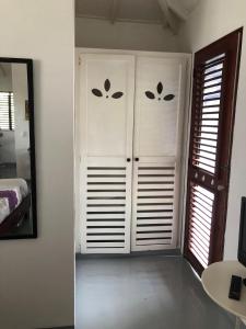 Postel nebo postele na pokoji v ubytování Hotel Casa Robinson