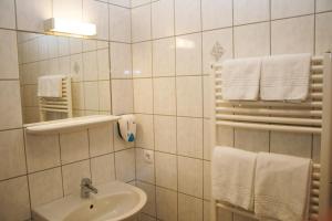 Koupelna v ubytování G&K Hotel