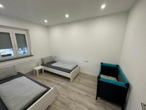 Un pat sau paturi într-o cameră la Ferienwohnung FLOTT
