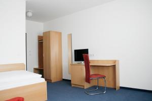 Postel nebo postele na pokoji v ubytování G&K Hotel