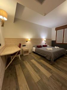 Postel nebo postele na pokoji v ubytování Damodoro Hotel