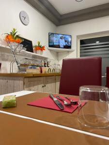 TV a/nebo společenská místnost v ubytování Damodoro Hotel + 12 fotografií