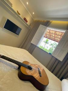 TV a/nebo společenská místnost v ubytování Casa de campo a 2,5 km de Itaberaba