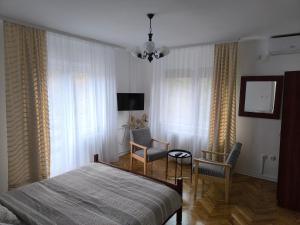 TV a/nebo společenská místnost v ubytování Guest House Major